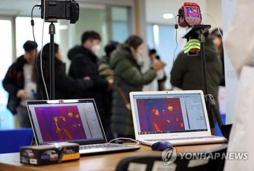 Thermal cameras are installed at the entrance of Jangchung Arena in Seoul on Feb. 5, 2020, as South Korea confirmed four more cases of the novel coronavirus, bringing the total here to 23. (Yonhap)
