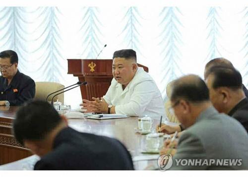 North Korean leader Kim Jong-un speaks during a politburo meeting of the ruling Workers' Party in this photo released by the North's official Korean Central News Agency on June 8, 2020. (For Use Only in the Republic of Korea. No Redistribution) (Yonhap)