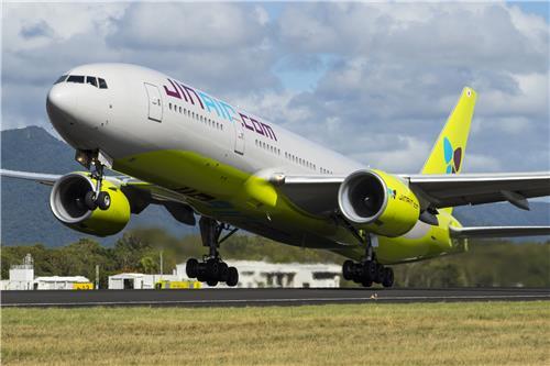 This undated file photo provided by Jin Air shows a B777-200ER taking off at Gimpo International Airport in Seoul. (PHOTO NOT FOR SALE) (Yonhap)