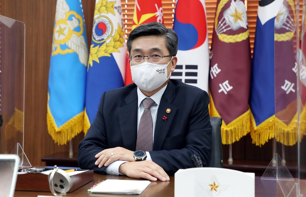 Defense Minister Suh Wook poses for a picture during a press conference held in Seoul on Jan. 27, 2021, in this photo provided by his office. (PHOTO NOT FOR SALE) (Yonhap)