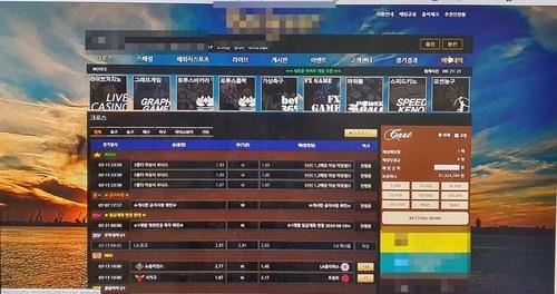 This photo provided by the Busan Metropolitan Police Agency shows an illegal gambling site busted by investigators. (PHOTO NOT FOR SALE) (Yonhap) 