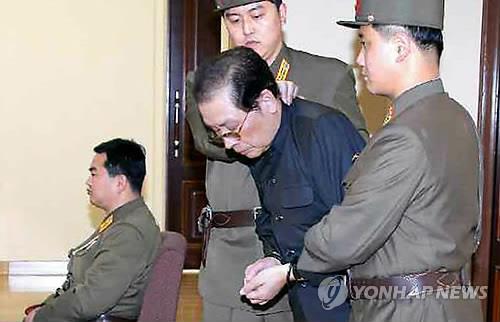 In this file photo released by North Korea's official paper Rodong Sinmun, Jang Song-thaek, leader Kim Jong-un's once powerful uncle, stands trial before a special military tribunal in Pyongyang on Dec. 12, 2013. The newspaper reported the next day Jang was executed immediately after the tribunal found him guilty of treason. (For Use Only in the Republic of Korea. No Redistribution) (Yonhap)