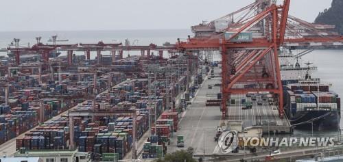 This photo, taken June 10, 2022, shows stacks of containers at a port in South Korea's southeastern city of Busan. (Yonhap)