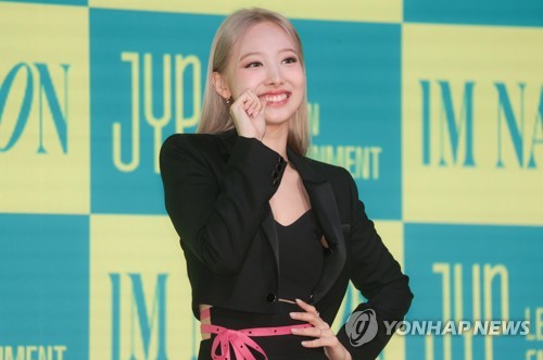 Nayeon, a member of TWICE, poses for the camera during a press conference for her first EP as a solo artist at a Seoul hotel on June 24, 2022. (Yonhap)