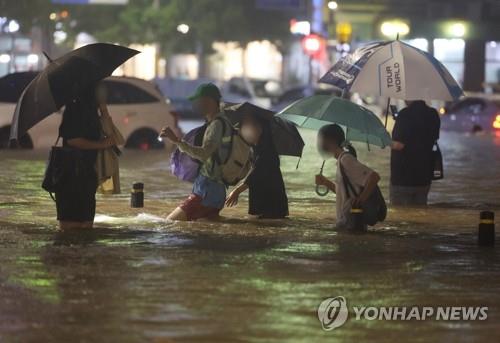  Heavy rain-caused deaths stand at 14; number of missing rises to 6