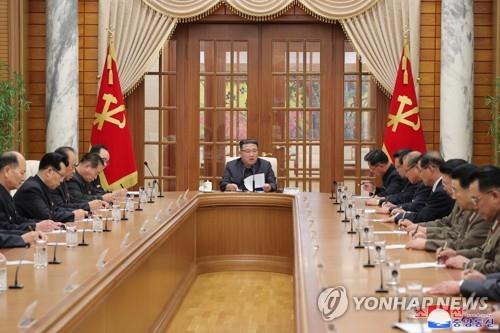 This photo, carried by North Korea's official Korean Central News Agency on Dec. 1, 2022, shows the North's leader Kim Jong-un (C) presiding over a meeting of the political bureau of the ruling Workers' Party Korea in Pyongyang. [For Use Only in the Republic of Korea. No Redistribution] (Yonhap)