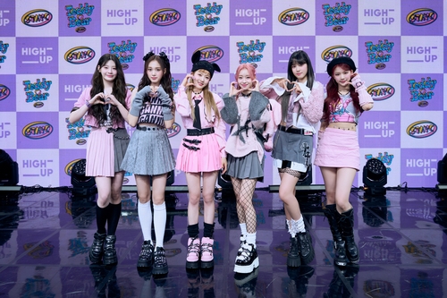 Girl group STAYC poses for the camera during a media showcase for its upcoming single "Teddy Bear" at a music hall in eastern Seoul on Feb. 14, 2023, in this photo provided by High Up Entertainment. (PHOTO NOT FOR SALE) (Yonhap)