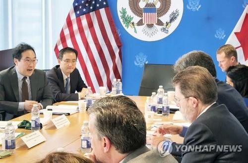 This file photo, provided by the industry ministry, shows South Korea's Second Vice Foreign Minister Lee Do-hoon (L) speaking during a meeting on launching the Minerals Security Partnership in Canada on June 15, 2022. (PHOTO NOT FOR SALE) (Yonhap) 
