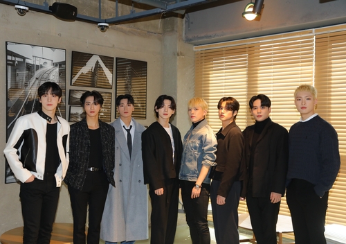 K-pop boy group Ateez poses for the camera in this photo provided by KQ Entertainment. (PHOTO NOT FOR SALE) (Yonhap)