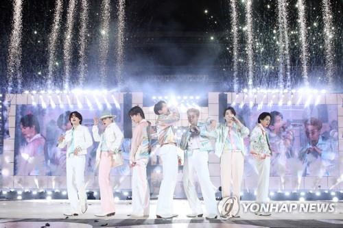 In this undated photo provided by Big Hit Entertainment on March 14, 2022, K-pop supergroup BTS performs at the BTS Permission to Dance on Stage - SEOUL online and offline concert at Jamsil Olympic Stadium in Seoul. BTS held three concerts on March 10, 12 and 13, respectively. (PHOTO NOT FOR SALE) (Yonhap)