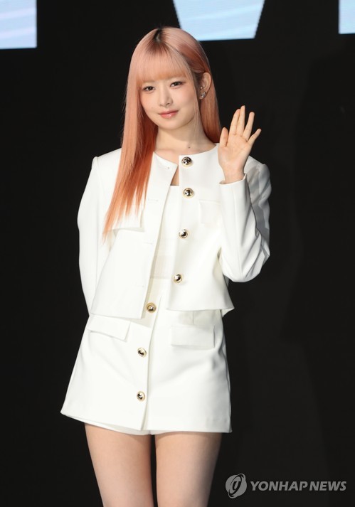 Rei, a member of K-pop girl group Ive, poses for a photo during a press conference to promote the group's first studio album in Seoul on April 10, 2023. (Yonhap)