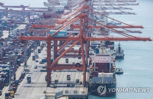 Containers are stacked at a port in Busan, 320 kilometers southeast of Seoul, on May 10, 2023. (Yonhap)