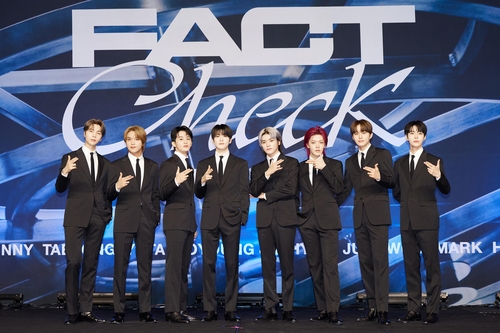K-pop group NCT 127 poses for photos during a press conference at a Seoul hotel on Oct. 6, 2023, to promote its fifth full-length album, "Fact Check," in this photo provided by SM Entertainment. (PHOTO NOT FOR SALE) (Yonhap)