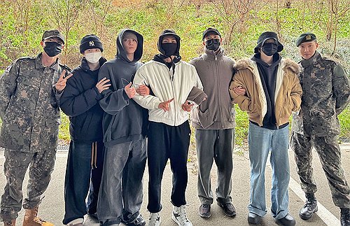 K-pop boy group BTS poses for a photo after they arrived at a military boot camp in Nonsan, South Chungcheong Province, on Dec. 11, 2023, to see off members RM and V, who entered the camp to receive five weeks of basic military training, in this photo captured from the group's account on X, formerly known as Twitter. (Yonhap)