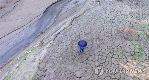 지난달 7일 소양강댐 상류에 비가 내리는 모습. [연합뉴스 자료사진]