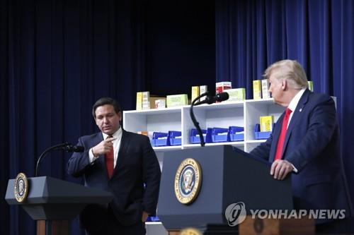 드샌티스 주지사(왼쪽)과 트럼프 전 대통령