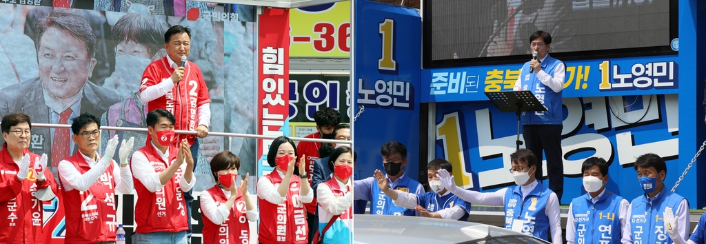 증평지역 출마자들과 합동유세 펼치는 김영환(왼쪽) 후보와 노영민 후보