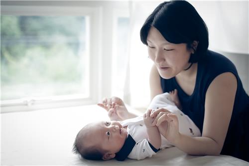 Kim Soo-bin, Chairman of the Nabu Association, and his first baby