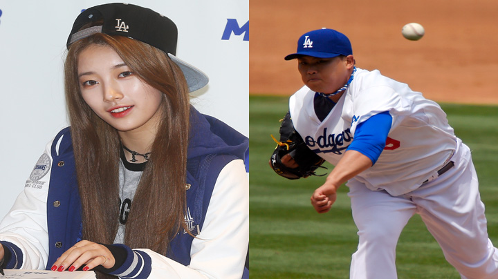 Los Angeles Dodgers starting pitcher Hyun-Jin Ryu, left, of South Korea,  poses with South Korean singer Suzy after she threw the ceremonial first  pitch before the team's baseball game against the Cincinnati