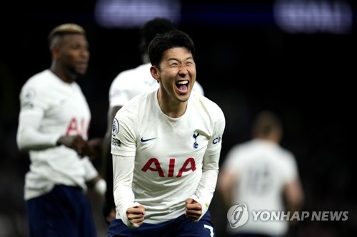 In this Associated Press photo, Son Heung-min of Tottenham Hotspur celebrates after scoring a goal against Arsenal during the clubs' Premier League match at Tottenham Hotspur Stadium in London on May 12, 2022. (Yonhap)