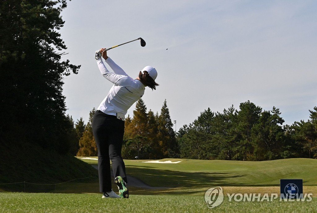 In this AFP photo, Ko Jin-young of South Korea tees off at the fourth hole during the final round of the BMW Ladies Championship at LPGA International Busan in Busan, some 450 kilometers southeast of Seoul, on Oct. 24, 2021. (Yonhap)