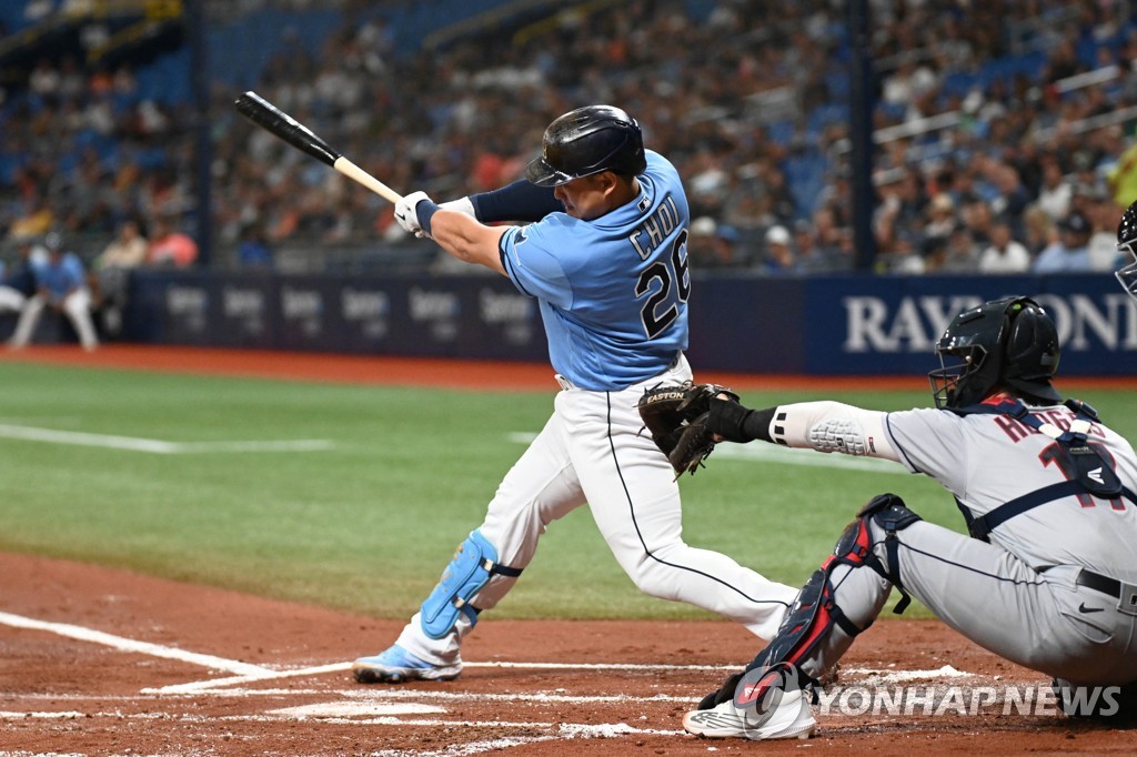 In this USA Today Sports photo via Reuters, Choi Ji-man of the Tampa Bay Rays hits an RBI single against the Cleveland Guardians during the bottom of the first inning of a Major League Baseball regular season game at Tropicana Field in St. Petersburg, Florida, on July 29, 2022. (Yonhap)
