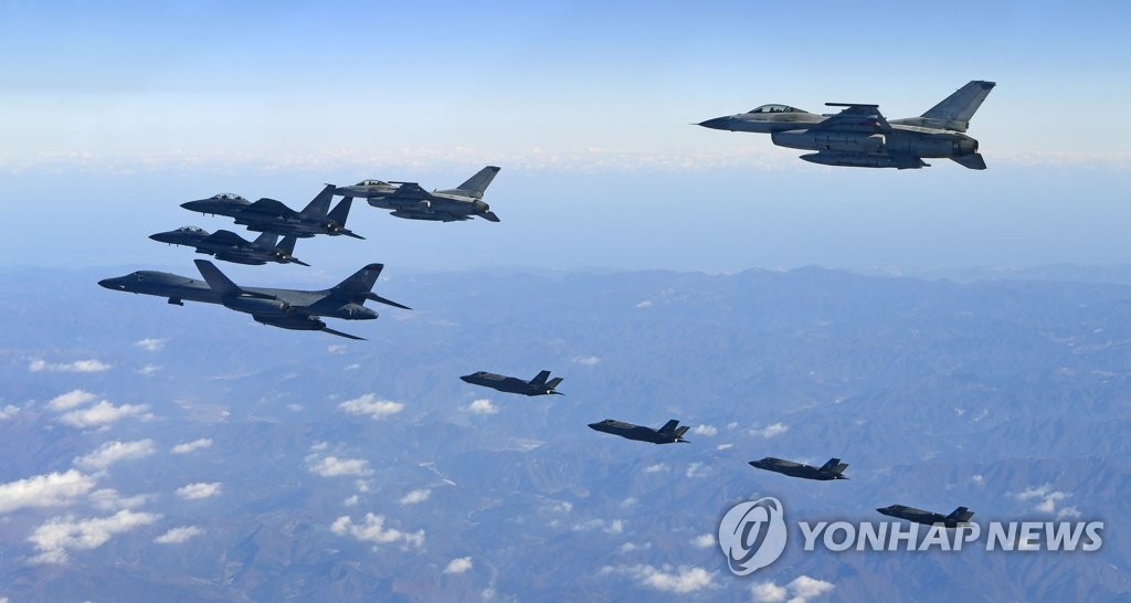 In this file photo taken on Dec. 6, 2017, and provided by the Air Force, a B-1B Lancer strategic bomber, two F-35A and two F-35B stealth jets of the U.S. and two F-16K and two F-15K fighters of South Korea fly in formation over the Korean Peninsula during the annual joint Korea-U.S. air force drill Vigilant Ace. (PHOTO NOT FOR SALE) (Yonhap)