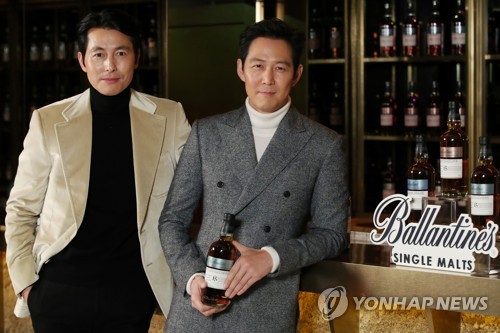 Acteurs Lee Jung-jae et Jung Woo-sung