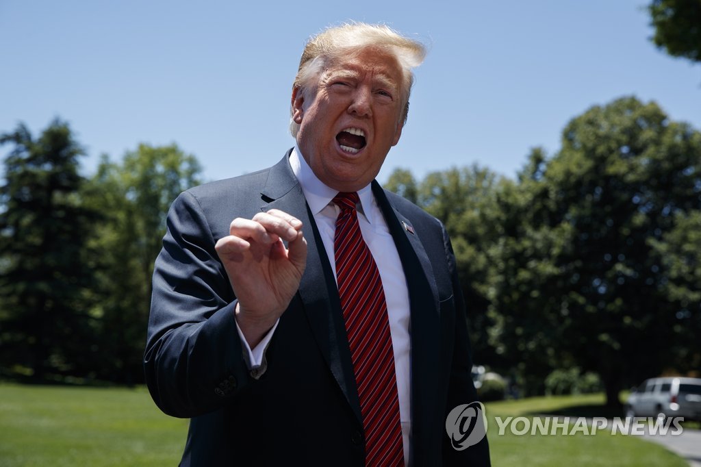 Trump denies he is against spying on N. Korea