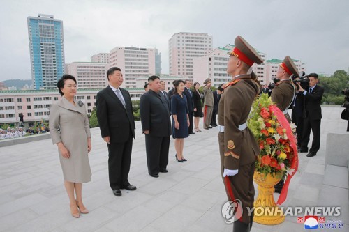 Xi, Kim pay homage at Friendship Tower