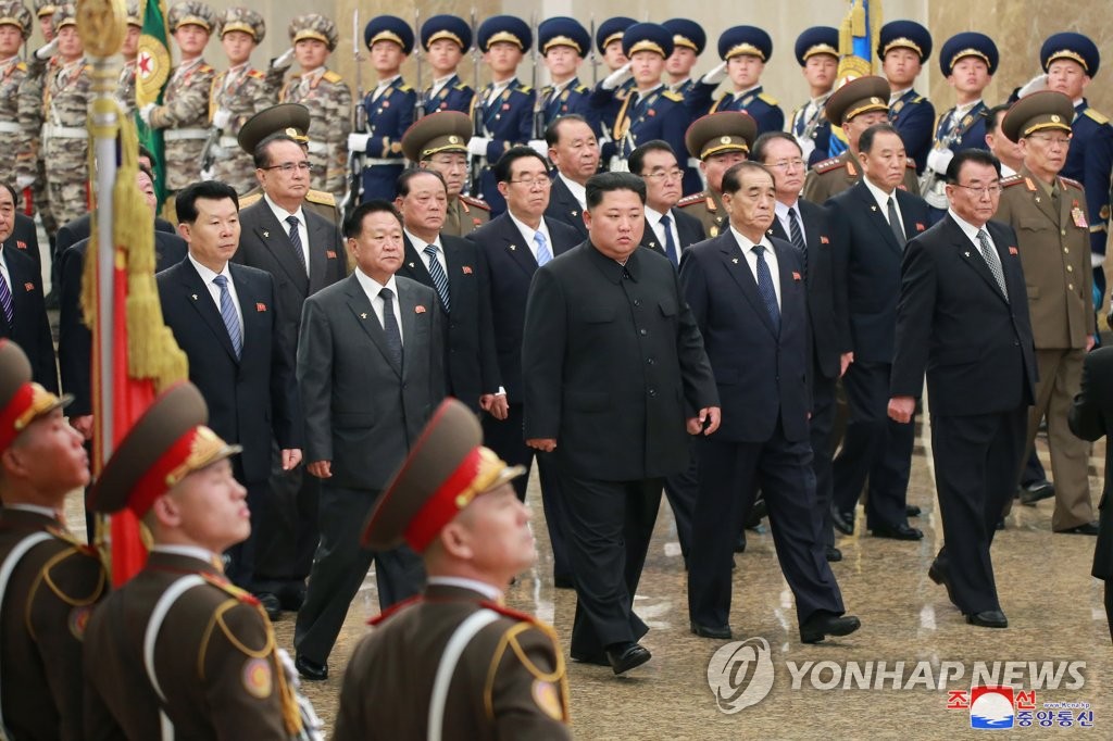 North Korean leader Kim Jong-un (C, front) visits the Kumsusan Palace of the Sun in Pyongyang on Dec. 17, 2019, to pay tribute to his deceased father, Kim Jong-il, as the North marks the eighth anniversary of the former leader's death, in this photo released by North Korea's official Korean Central News Agency. The mausoleum enshrines the mummified bodies of Kim Il-sung, the current leader's grandfather and the founder of the North Korean government, and Kim Jong-il. (For Use Only in the Republic of Korea. No Redistribution) (Yonhap)