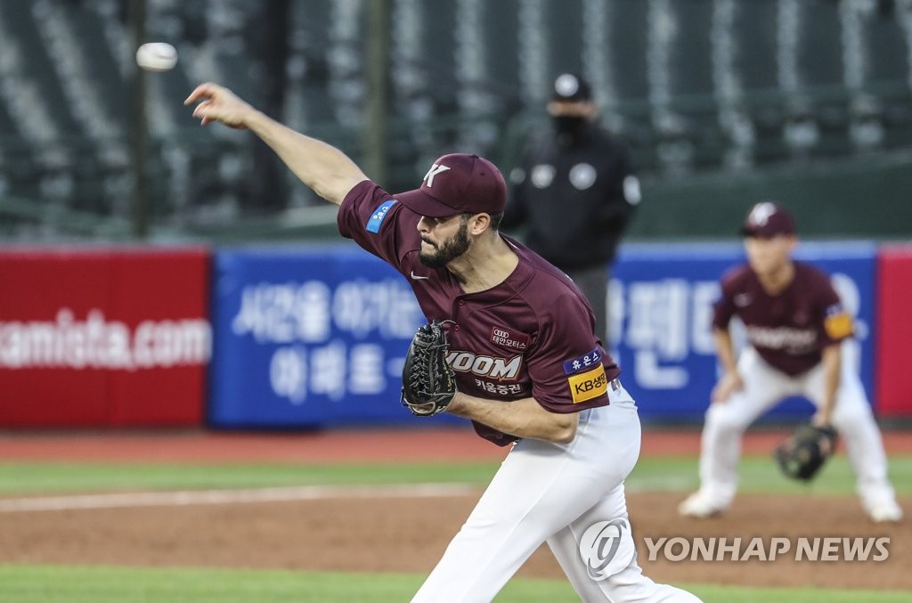 In this file photo from May 22, 2020, Jake Brigham of the Kiwoom Heroes pitches against the Lotte Giants during a Korea Baseball Organization regular season game at Sajik Stadium in Busan, 450 kilometers southeast of Seoul. (Yonhap)