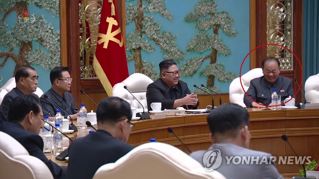 Ri Pyong-chol (in red circle), vice chairman of the Central Military Commission of North Korea's ruling Workers' Party, sits next to North Korean leader Kim Jong-un during a meeting of the political bureau of the central committee of the party in Pyongyang on Oct. 5, 2020, in this photo captured from the Korean Central Television Broadcasting Station. It was decided at the meeting to wage an 80-day economic development campaign to mark the party's 75th founding anniversary and confer the title of marshal on Ri, who has led the country's nuclear and missile development. (For Use Only in the Republic of Korea. No Redistribution) (Yonhap)