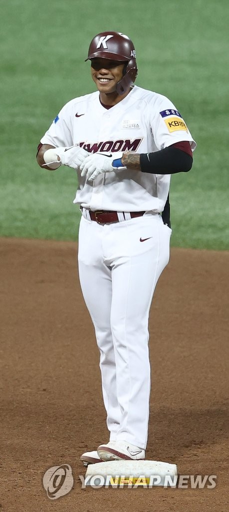 In this file photo from Oct. 7, 2020, Addison Russell of the Kiwoom Heroes smiles after hitting an RBI double against the NC Dinos in the bottom of the fourth inning of a Korea Baseball Organization regular season game at Gocheok Sky Dome in Seoul. (Yonhap)