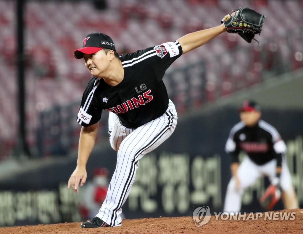 In this file photo from Oct. 23, 2020, Go Woo-suk of the LG Twins pitches against the Kia Tigers in the bottom of the ninth inning of a Korea Baseball Organization regular season game at Gwangju-Kia Champions Field in Gwangju, 330 kilometers south of Seoul. (Yonhap)