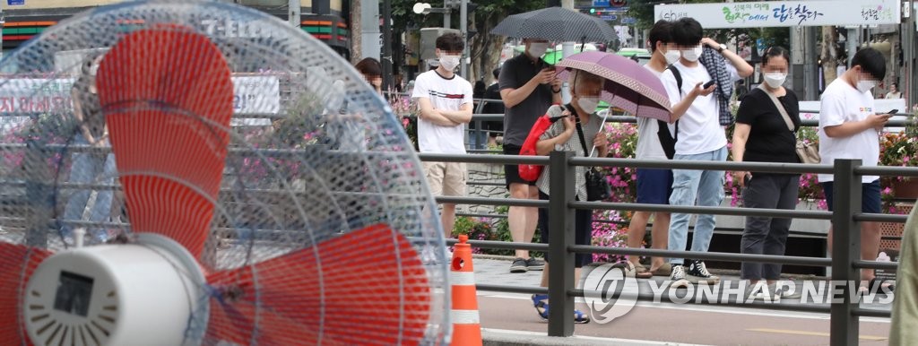 (3rd LD) S. Korea likely to report record high of over 1,400 coronavirus cases Wednesday