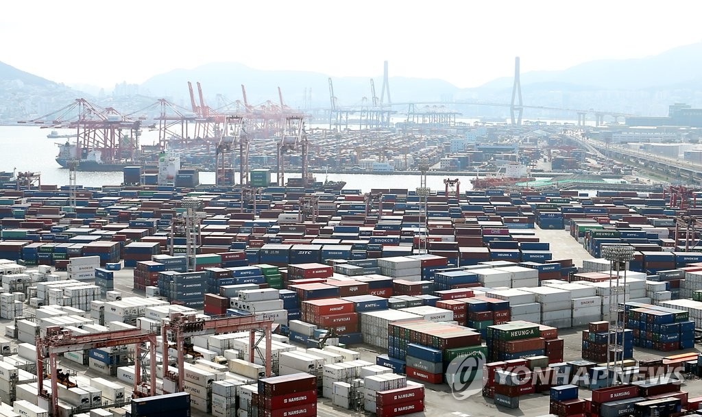 This file photo, taken Aug. 2, 2021, shows stacks of containers at a port in South Korea's southeastern city of Busan. (Yonhap)