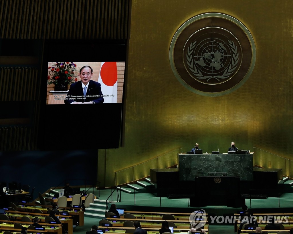 This EPA photo, released Sept. 24, 2021, shows Japanese Prime Minister Yoshihide Suga delivering a video message during the U.N. General Assembly in New York. (Yonhap)