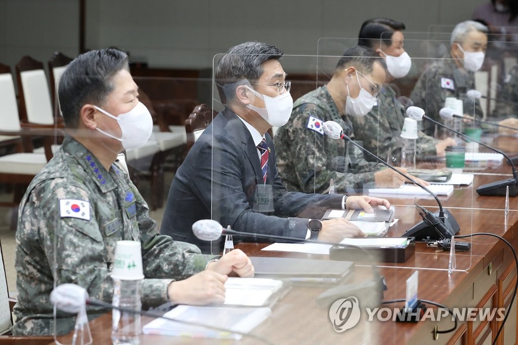 Defense Minister Suh Wook (2nd from L) and top military officials attend a meeting on space security operations at the defense ministry in Seoul on Nov. 3, 2021, in this photo released by the Korea Defense Daily. (PHOTO NOT FOR SALE) (Yonhap)