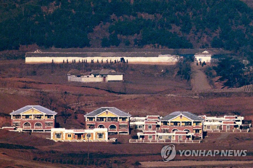 This file photo taken from an observatory in the South Korean border city of Paju on Jan. 7, 2022, shows the North Korean town of Kaepung on the western front-line border with South Korea. (Yonhap)