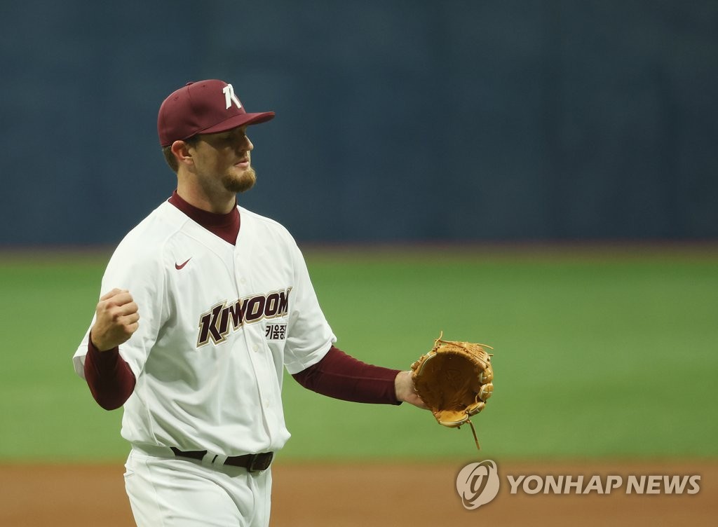 In this file photo, Tyler Eppler of the Kiwoom Heroes celebrates after completing the top of the first inning of a Korea Baseball Organization preseason game against the SSG Landers at Gocheok Sky Dome in Seoul on March 18, 2022. (Yonhap)