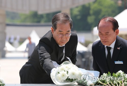 PM nominee at May 18 cemetery
