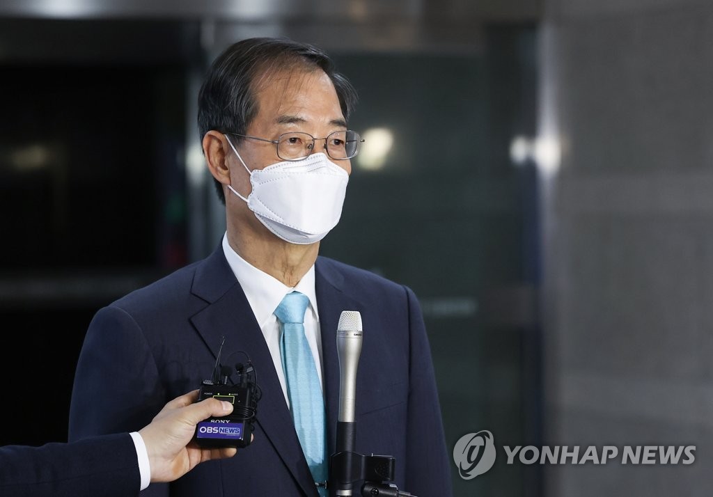 Prime Minister nominee Han Duck-soo speaks to reporters at his temporary office near the government complex in Seoul after his nomination was confirmed by the National Assembly on May 20, 2022. (Yonhap)