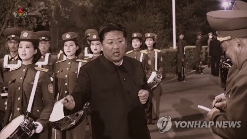 N.K. leader checks rehearsal for April military parade