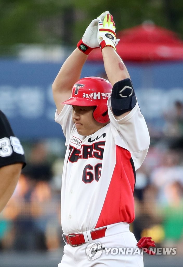 In this file photo from July 29, 2022, Lee Chang-jin of the Kia Tigers celebrates his RBI double against the SSG Landers during the bottom of the second inning of a Korea Baseball Organization regular season game at Gwangju-Kia Champions Field in Gwangju, 270 kilometers south of Seoul. (Yonhap)