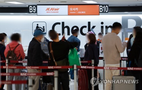 S. Korea's new COVID-19 cases fall below 20,000 amid 'twindemic' worries