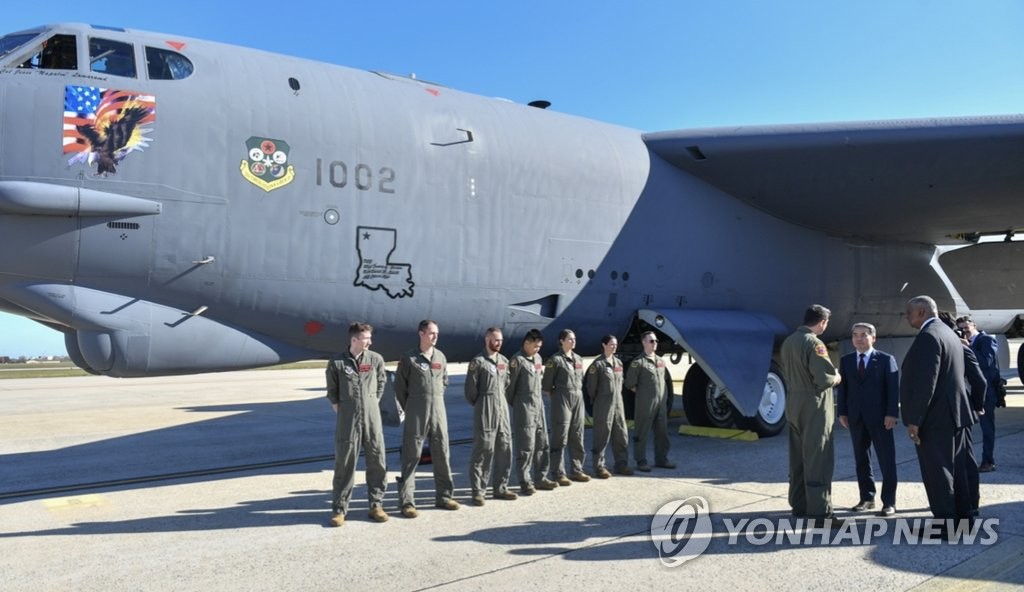 South Korean Defense Minister Lee Jong-sup (2nd from R) and his U.S. counterpart, Lloyd Austin (R), receive a briefing on B-1B and B-52 strategic bombers during a visit to Joint Base Andrews in Prince George's County, Maryland, on Nov. 3, 2022, in this photo provided by Seoul's defense ministry. (PHOTO NOT FOR SALE) (Yonhap)