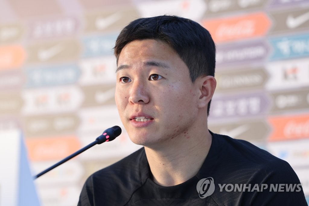South Korean midfielder Kwon Chang-hoon speaks at a press conference before a training session for the FIFA World Cup at Al Egla Training Site in Doha on Nov. 26, 2022. (Yonhap)
