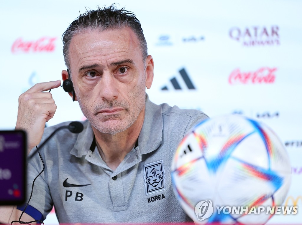 South Korea head coach Paulo Bento listens to a question at a press conference ahead of his team's Group H match against Portugal at the FIFA World Cup at the Main Media Centre in Al Rayyan, west of Doha, on Dec. 1, 2022. (Yonhap)