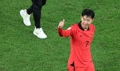 Son Heung-min of South Korea salutes the crowd after the team clinched a spot in the round of 16 at the FIFA World Cup with a 2-1 victory over Portugal at Education City Stadium in Al Rayyan, west of Doha, on Dec. 2, 2022. (Yonhap)